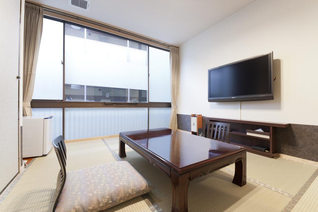 Kikunoya Hotel Хатсукаичи Стая снимка